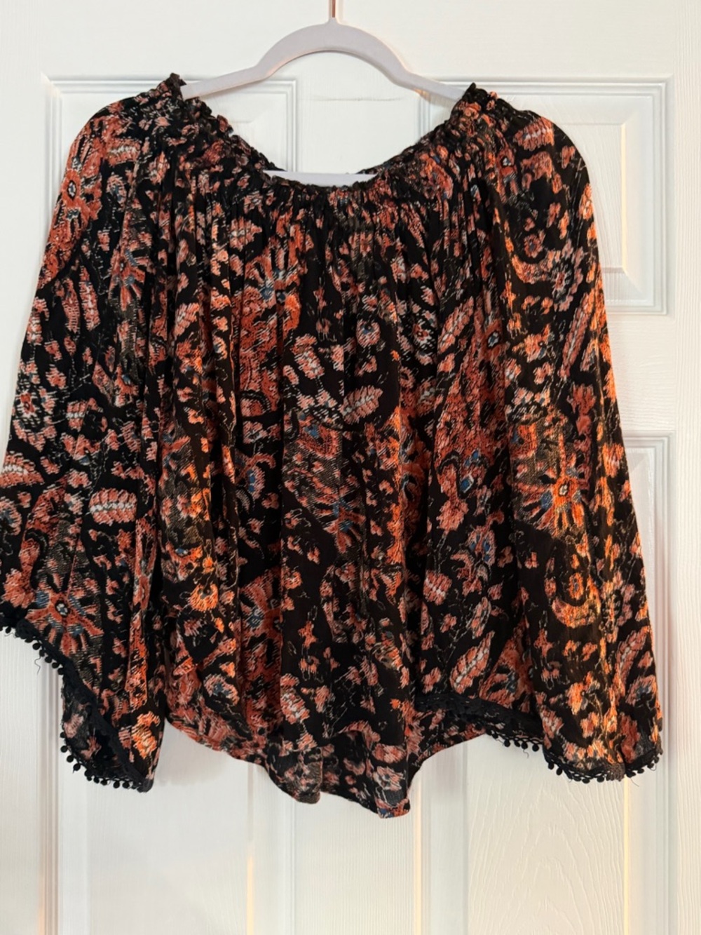 Women’s Black Floral Peasant Top with Orange Accents